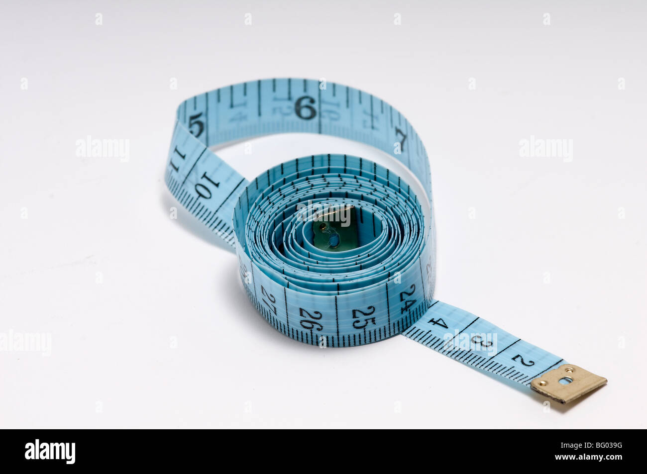 Top view of white soft measuring tape. Minimalist flat lay image of tape  measure with metric scale over blue background. Composition photo of tape  mea Stock Photo - Alamy