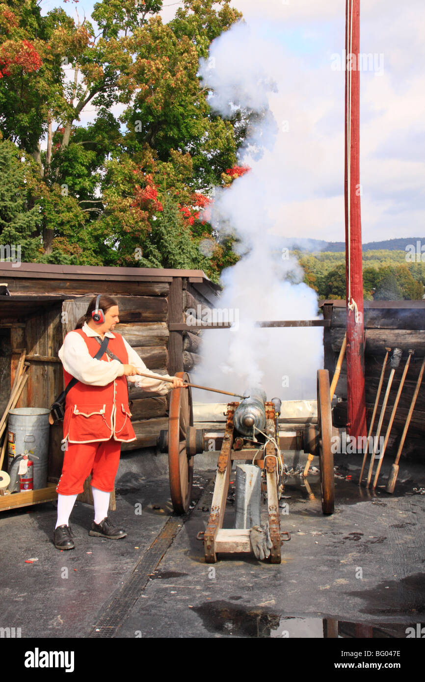 British Soldier Firing Canon, Fort William Henry, Lake George, New York Stock Photo