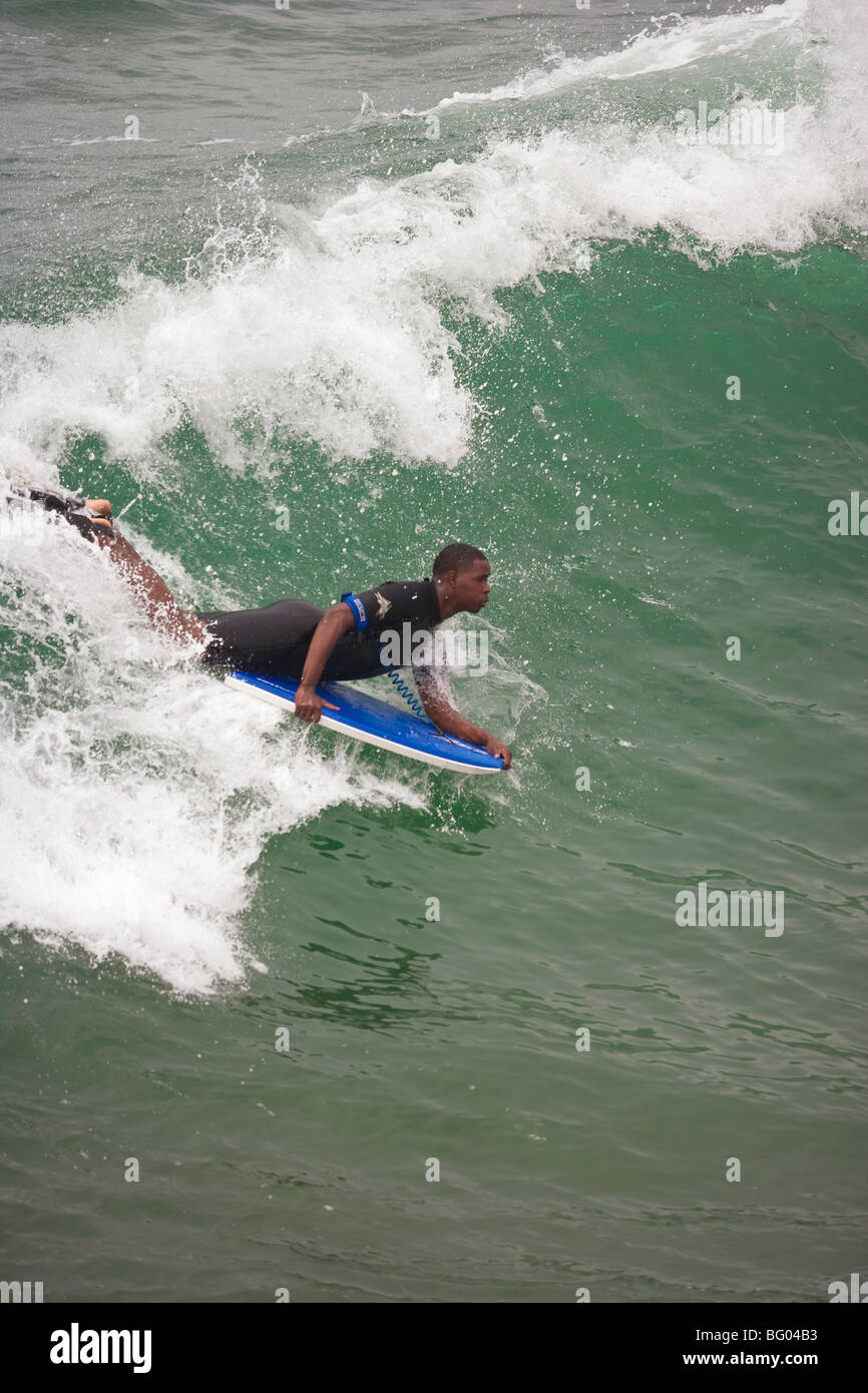 African-American boogie boarder, Manhattan Beach, California, United States of America Stock Photo