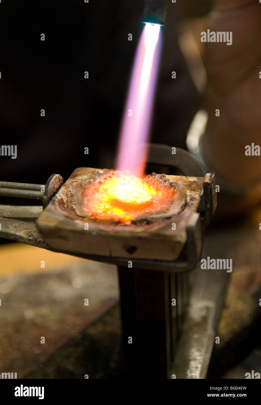 Melting gold at a jewellers Stock Photo Alamy