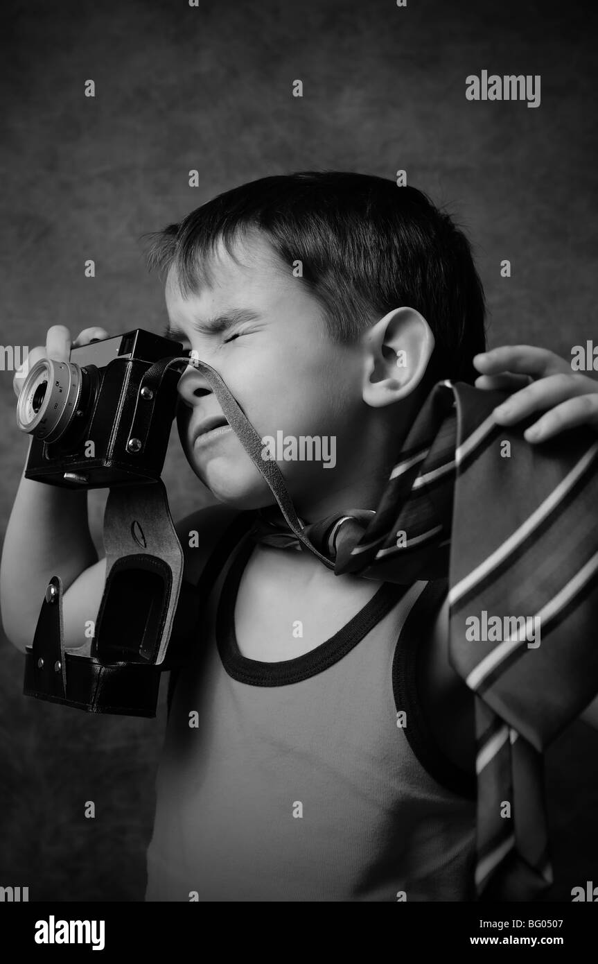 young boy taking a picture with his camera Stock Photo
