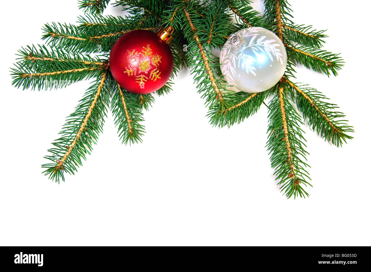 Christmas balls on fir tree branch on white background Stock Photo Alamy