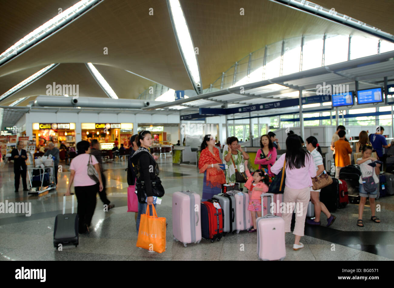 check-in counter scene, International Airport, Kuala Lumpur Malaysia Stock Photo
