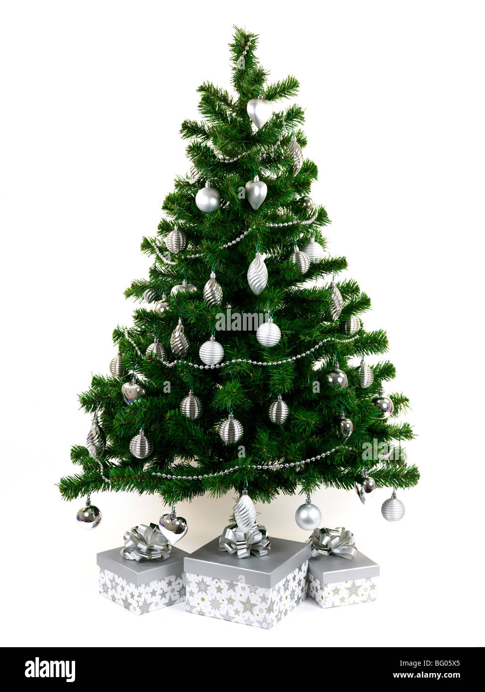 A Christmas tree isolated against a white background Stock Photo - Alamy