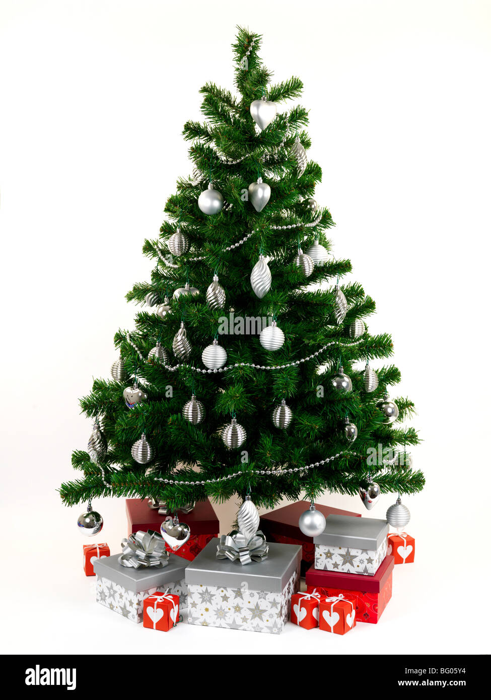 A Christmas tree isolated against a white background Stock Photo - Alamy