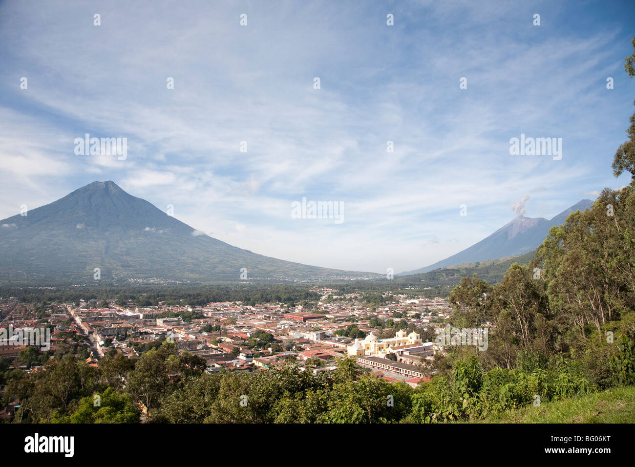 Volcan Agua seen from the cerro de la cruz viewpoint and view over Antigua Guatemala. Stock Photo
