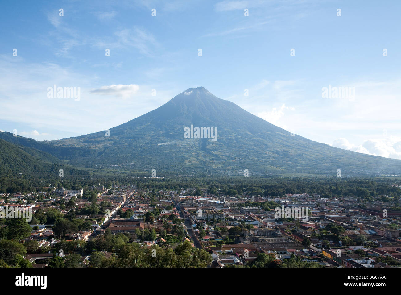 Volcan Agua seen from the cerro de la cruz viewpoint and view over Antigua Guatemala. Stock Photo