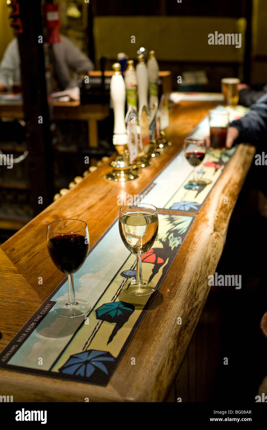 Alcoholic drinks on a bar in a public house in Essex. Photo by Gordon ...