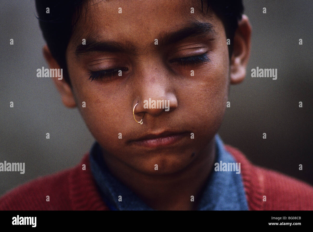 Portrait of a young Indian boy with nose ring, Bangalore, India ...