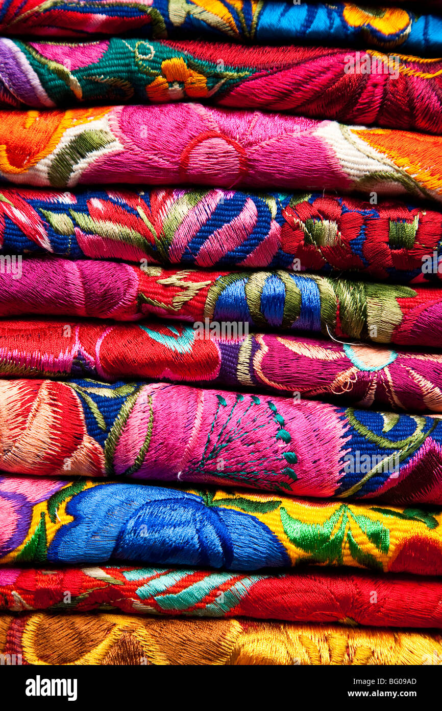 Stacked fabric at the market of Chichicastenango Guatemala. Stock Photo