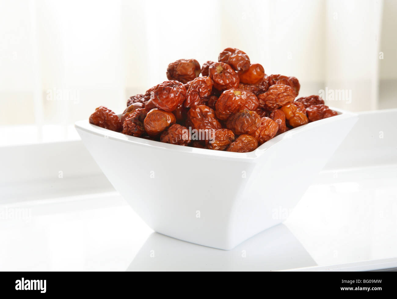 Red date (Jujube) used to strengthen heart and lungs, nourish the stomach and spleen, and support normal blood pressure Stock Photo