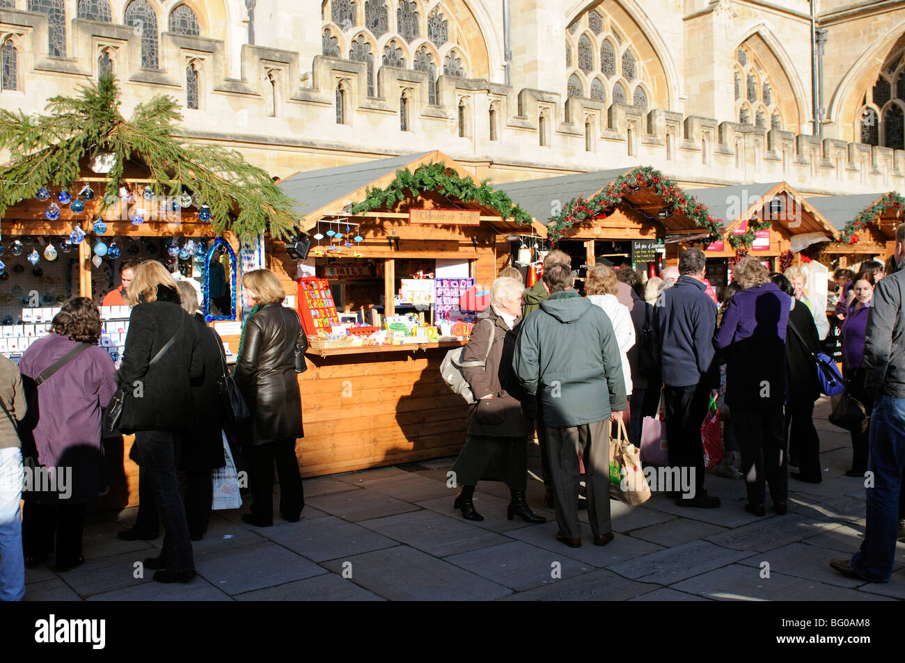 Bath Christmas market in the precincts of the Abbey customers and stall