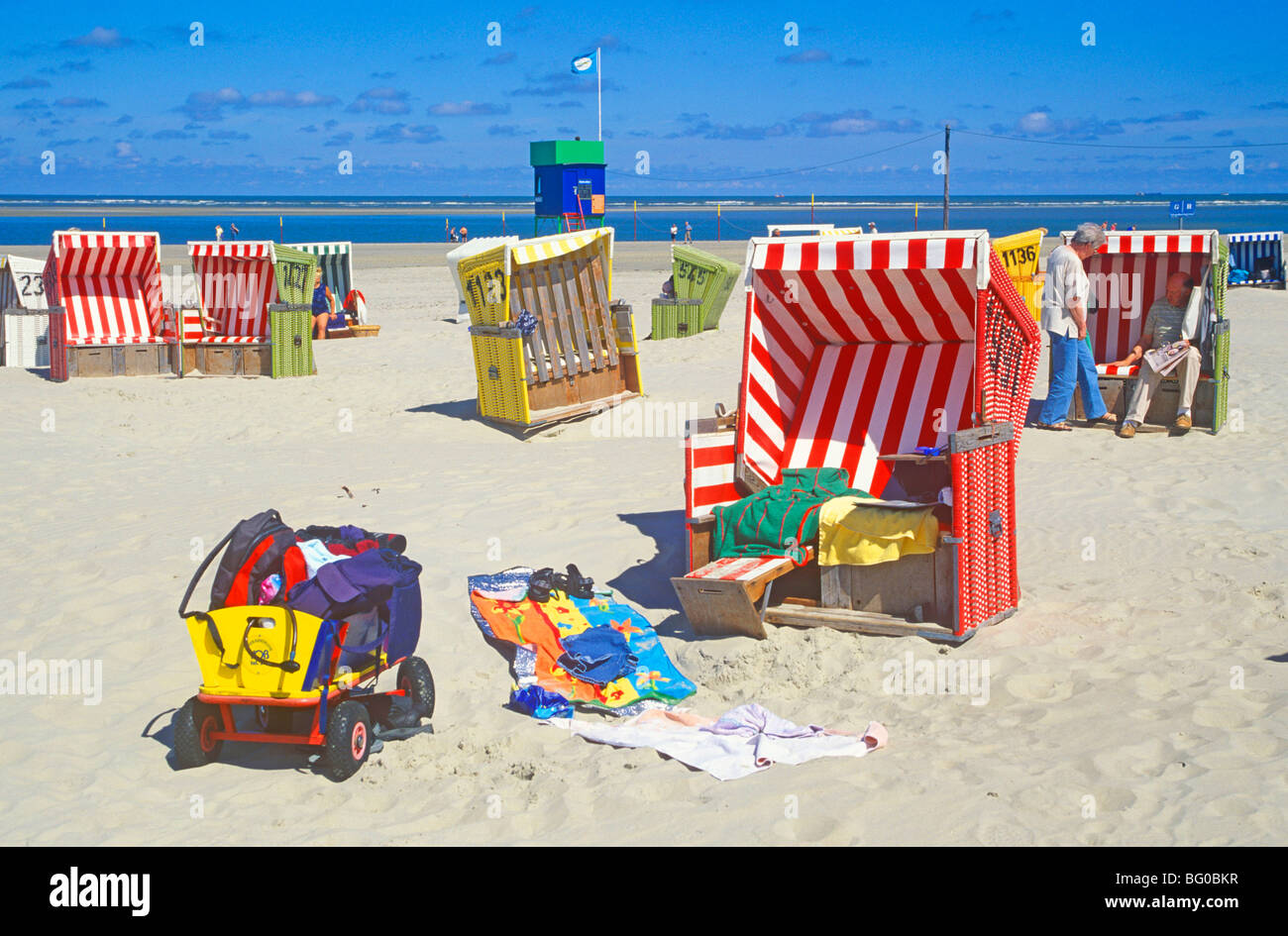 trolley and basket chairs at the main beach of Langeoog Island, East Friesland, Lower Saxony, Germany Stock Photo