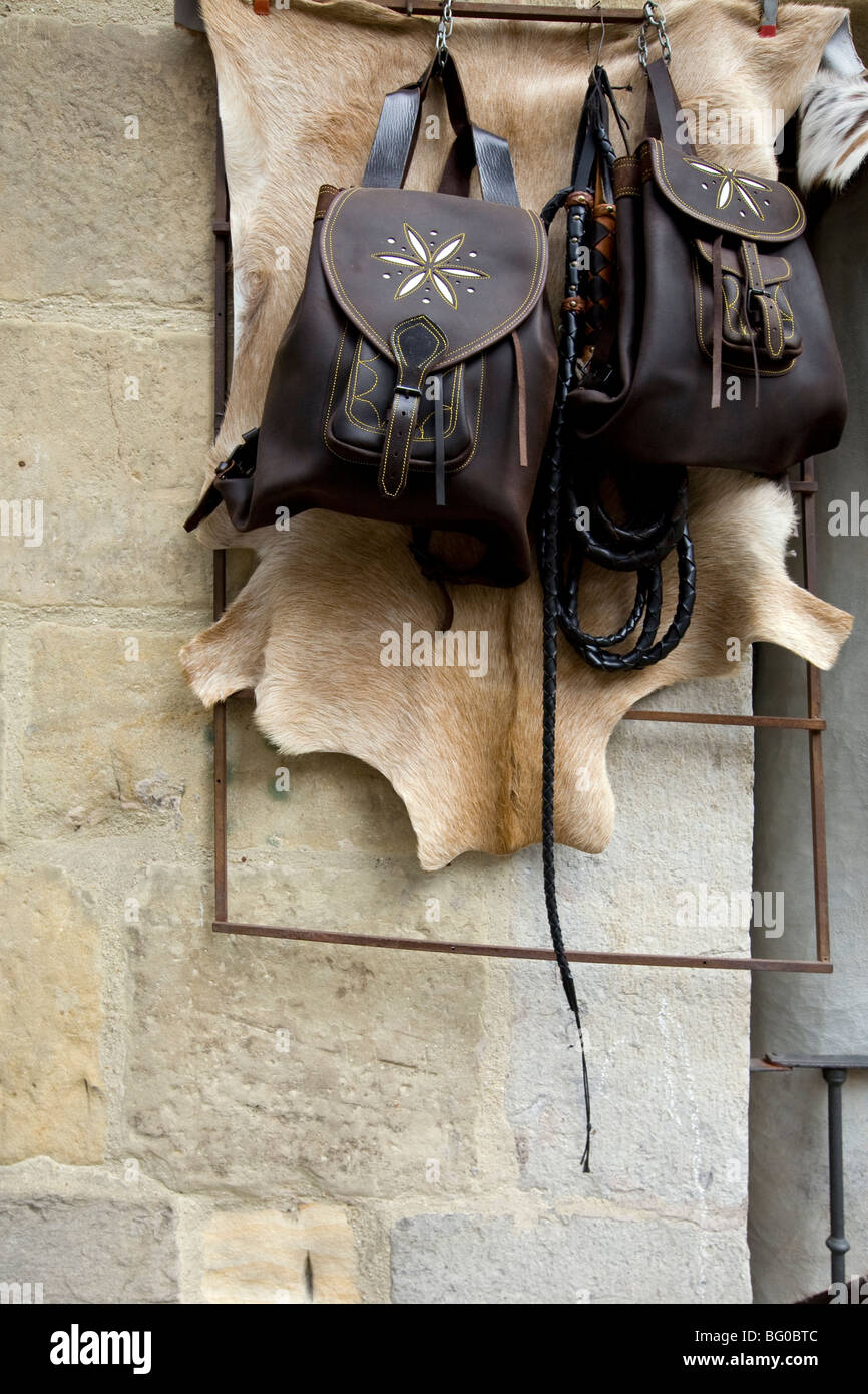 Leather bags with whip and animal skin at a market stall, Santander,  Cantabria, Spain Stock Photo - Alamy
