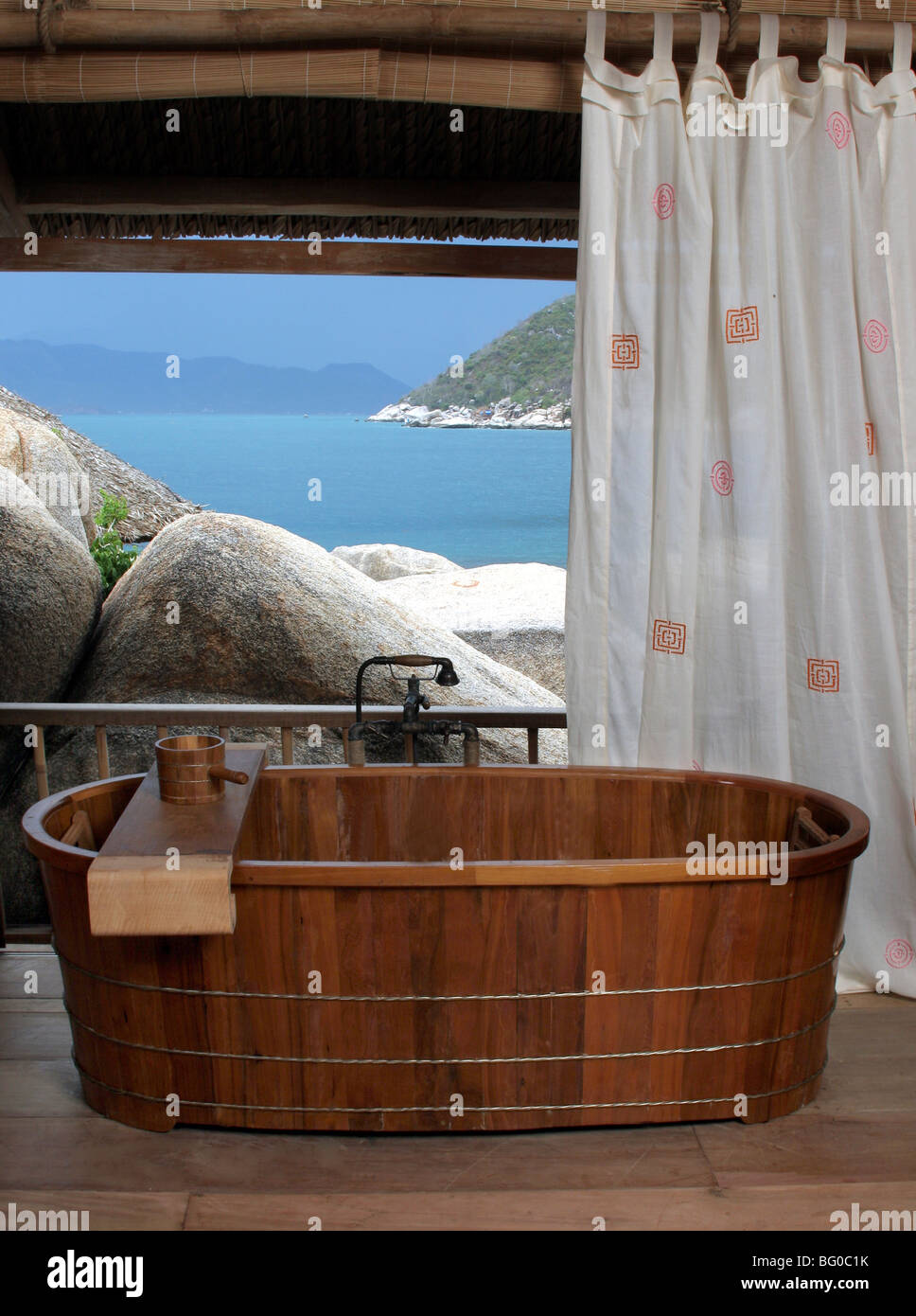 Bathroom with a wooden tub at the Evason Hideaway Resort and Spa in Nha Trang, Vietnam, Indochina, Southeast Asia, Asia Stock Photo