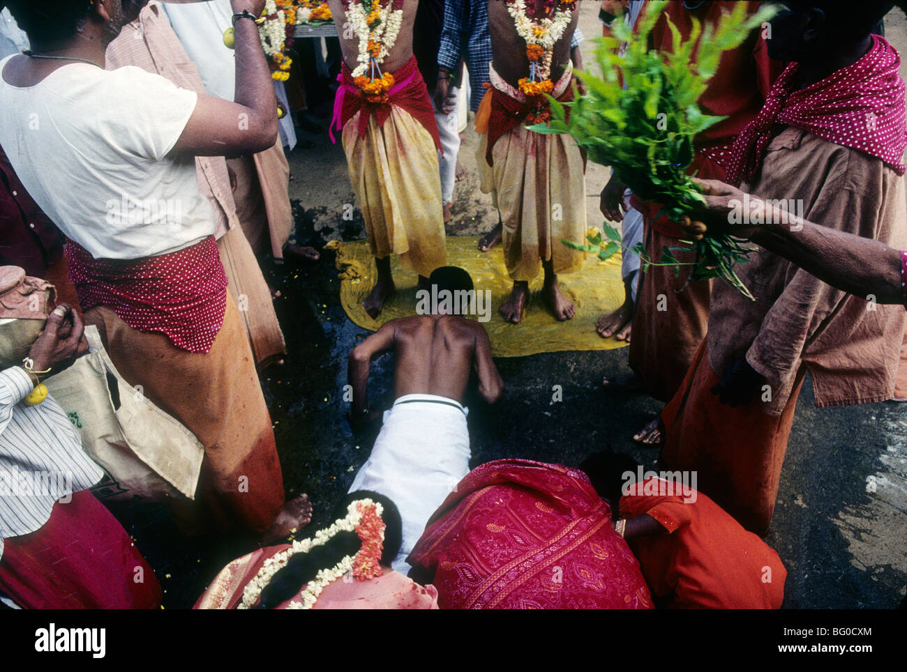 A Hindu Man Shows Devotion By Lying Prone At A Small Village Festival 