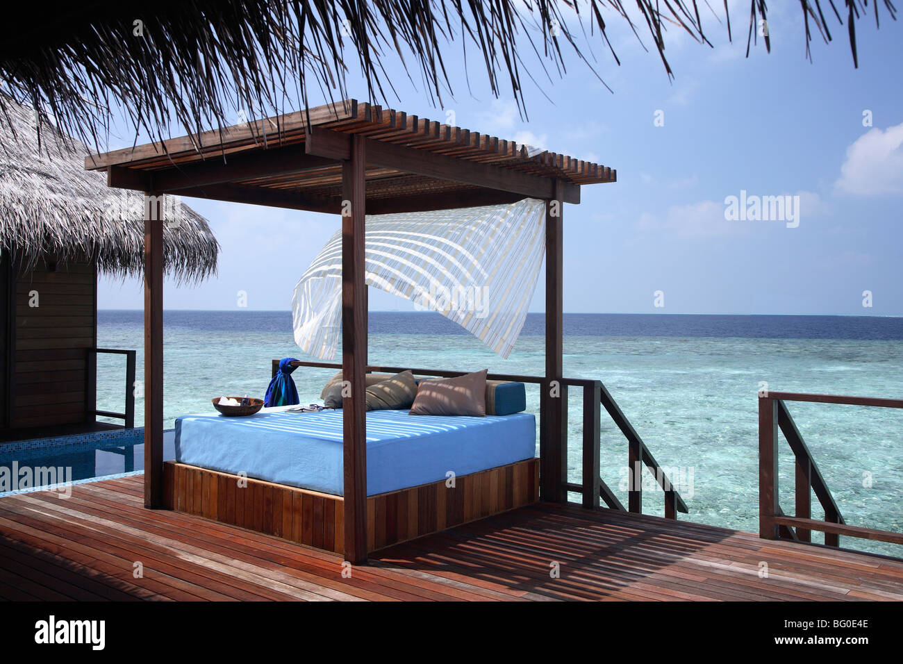 Pool deck of a villa at Coco Palm Bodu Hithi Resort in the Maldives, Indian Ocean, Asia Stock Photo