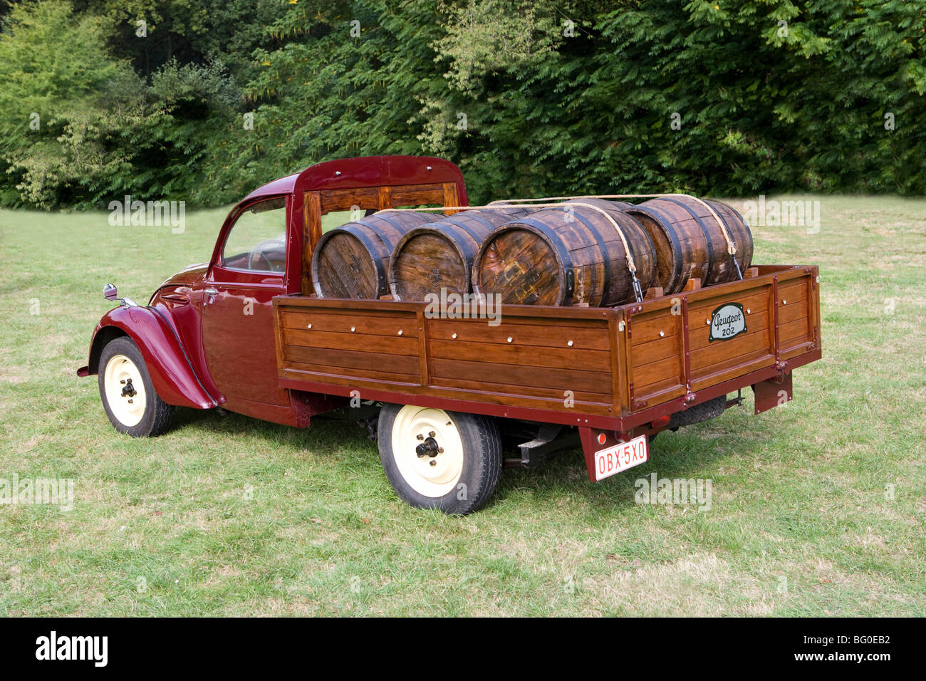 Peugeot 202, pick up, fifties, classic car, loaded with barrique wine barrels Stock Photo