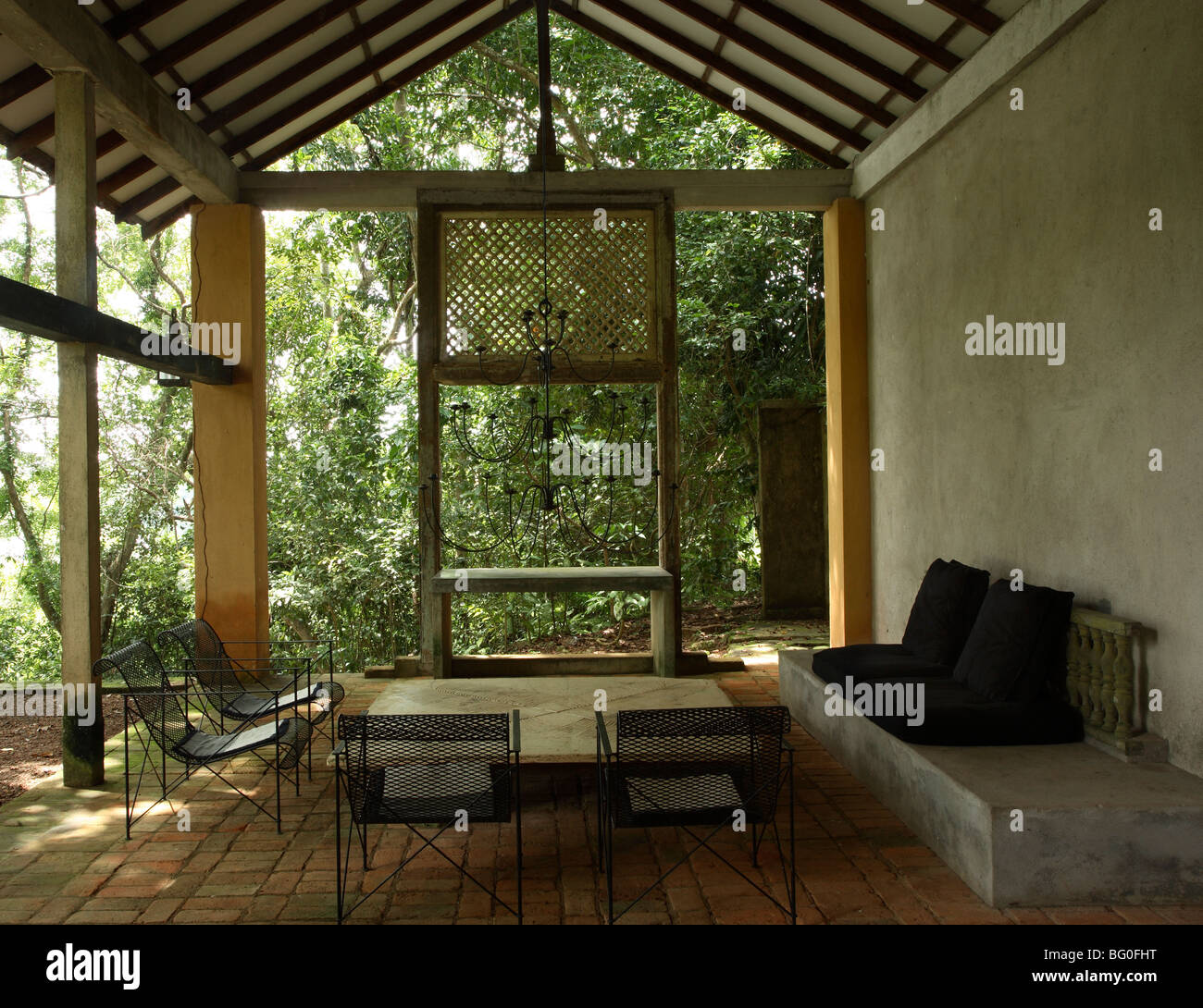 Verandah of the guesthouse at Lunuganga Garden Estate, garden developed