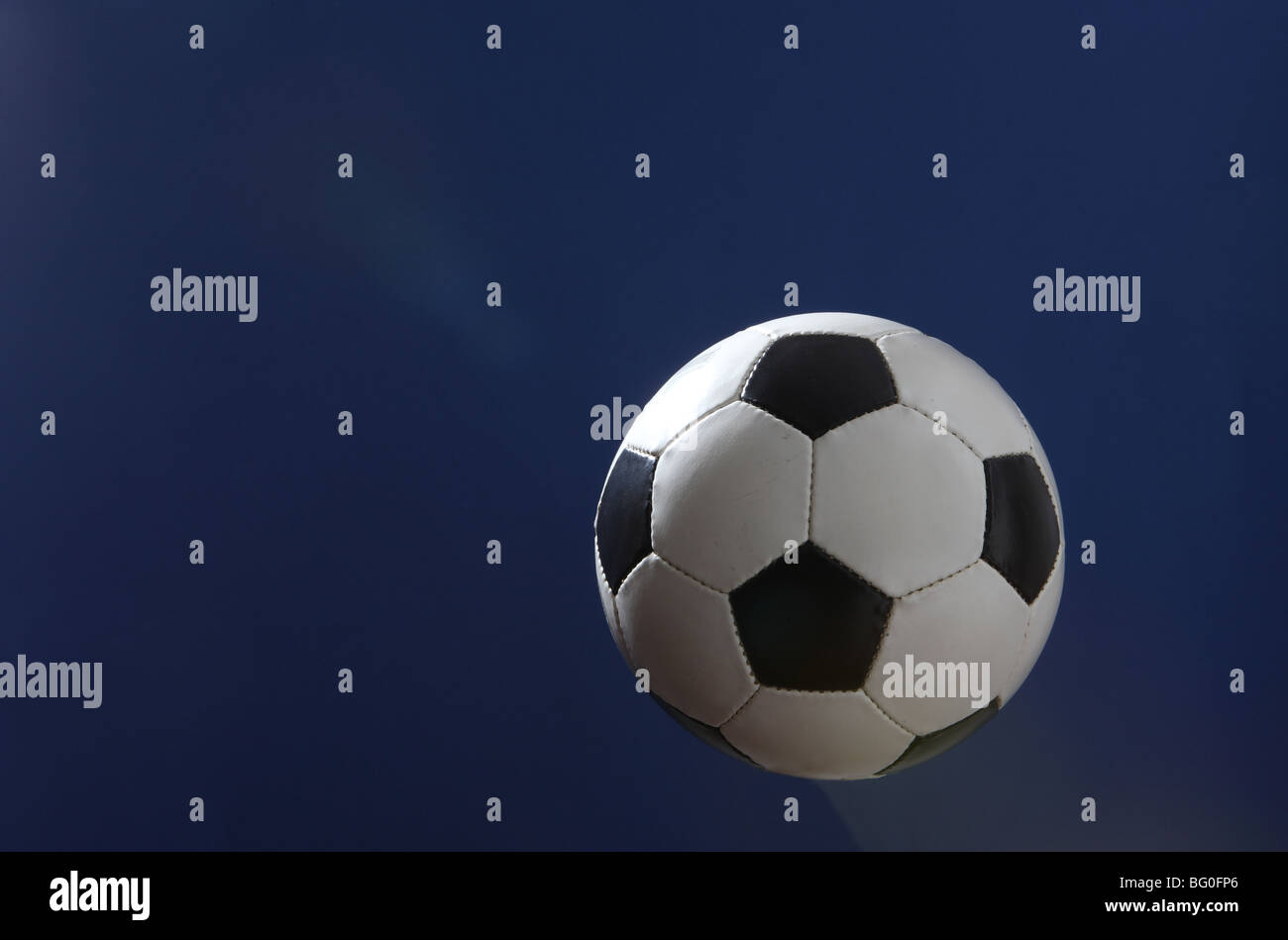 Soccer Ball in Air Stock Photo Alamy
