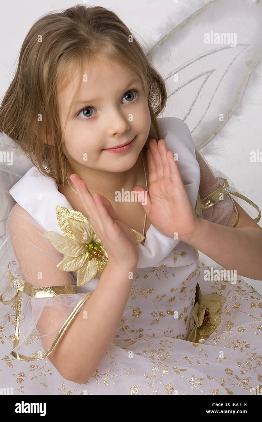 beautiful little girl in fairy dress with butterfly wings Stock Photo
