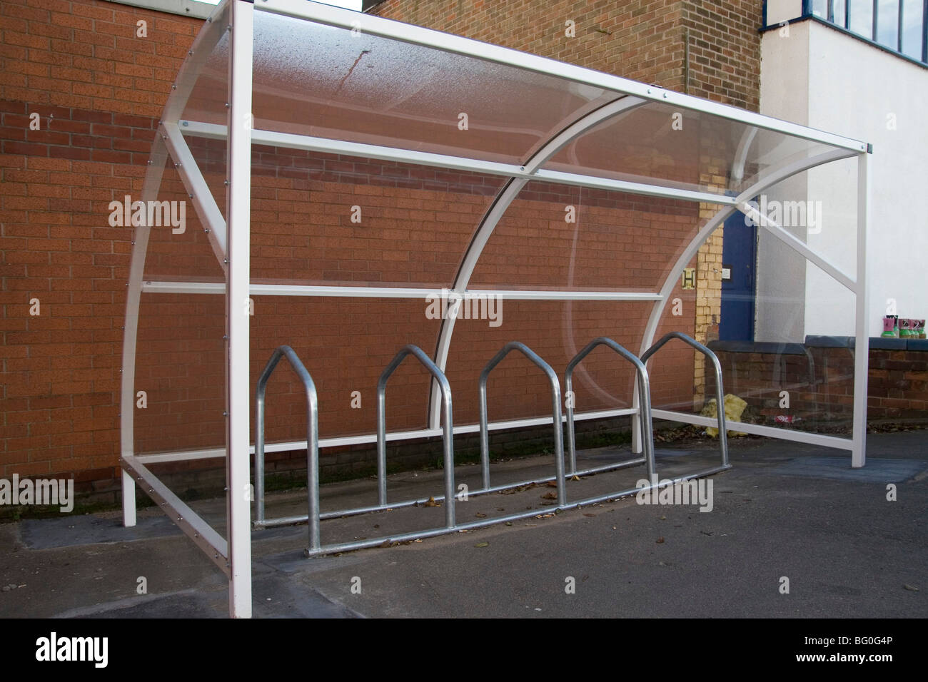 A bike rack outside a boat club Stock Photo Alamy
