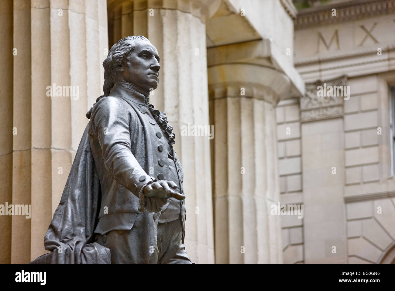 A statue of George Washington, first president of the United States, in front of Federal Hall in New York City, USA Stock Photo