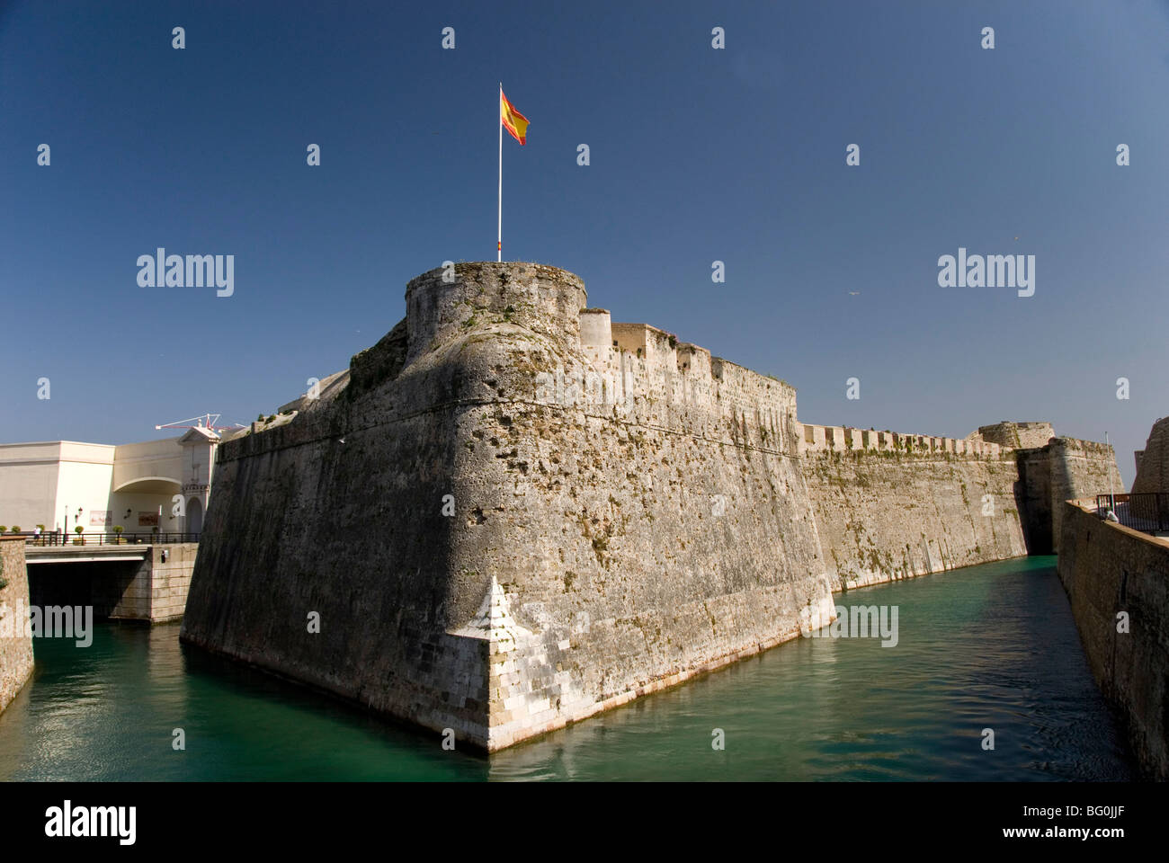 Defensive city wall and moat across narrow approach isthmus, Ceuta, the Spanish enclave on the coast of Morocco, North Africa Stock Photo