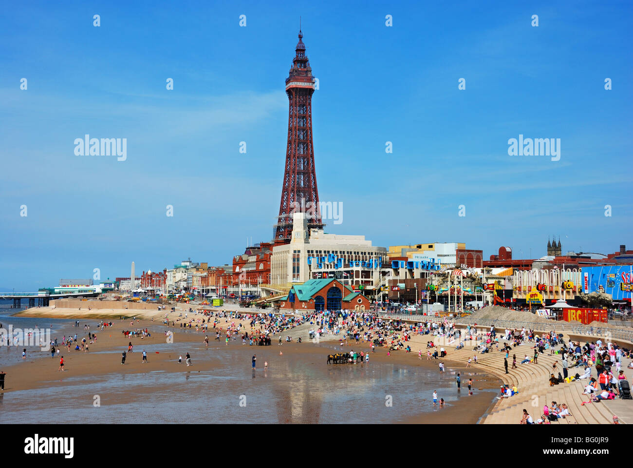 Blackpool, English seaside resort, showing beach (including donkey rides) and Blackpool Tower Stock Photo