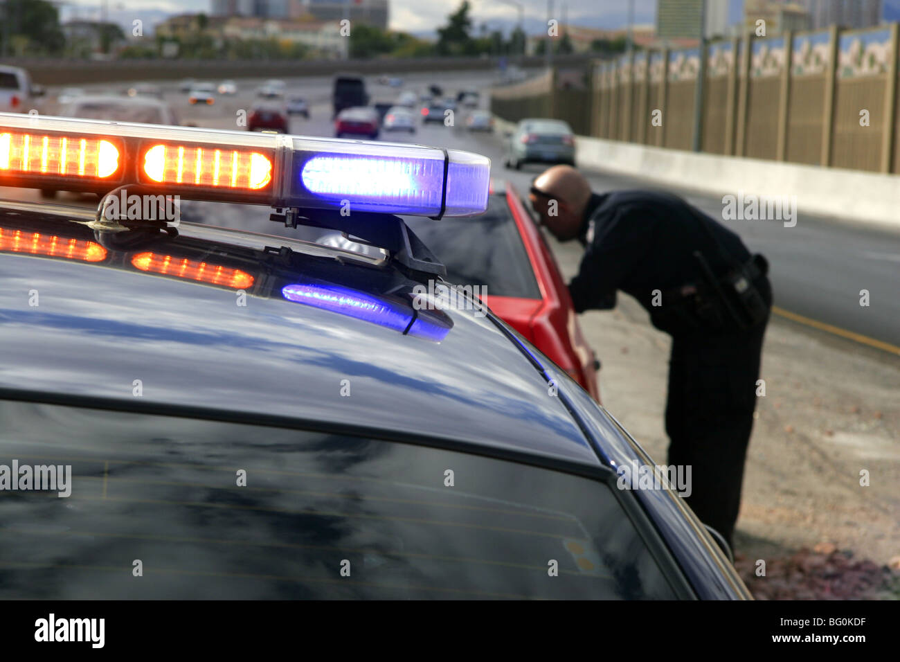 Nevada Highway Patrol State Trooper speaks with a driver about a traffic offence in Las Vegas, Nevada, USA Stock Photo