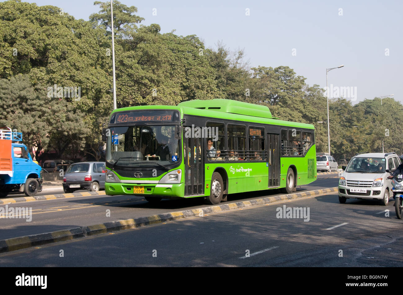 A CNG powered low floor bus of Delhi Transport drivers down the BRT priority bus lane Stock Photo