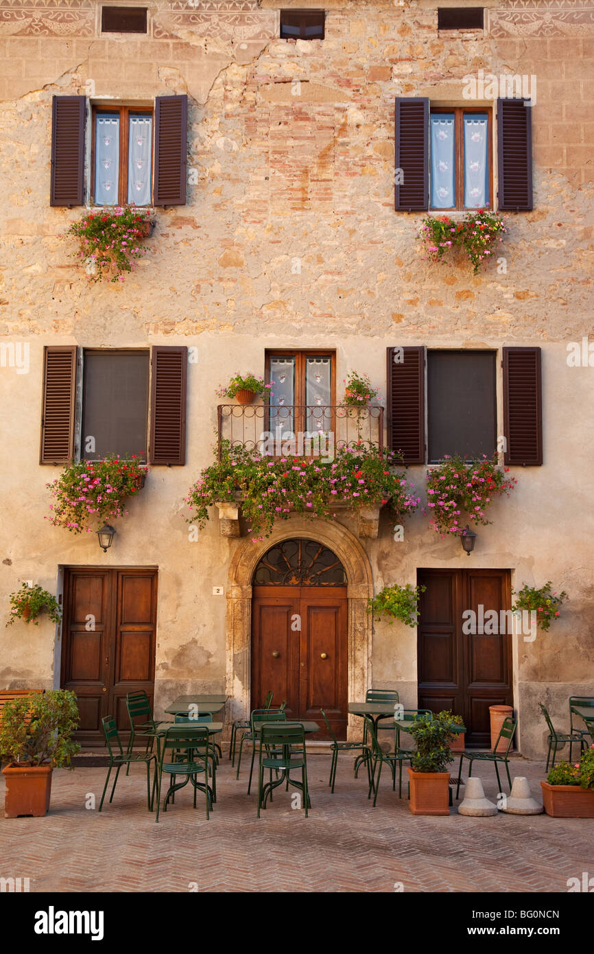 Beautiful home with an outdoor cafe on the lower level in Pienza Tuscany Italy Stock Photo