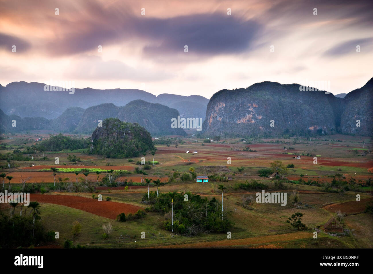 Dusk view across Vinales Valley showing limestone hills known as Mogotes, Vinales, UNESCO World Heritage Site, Cuba, West Indies Stock Photo