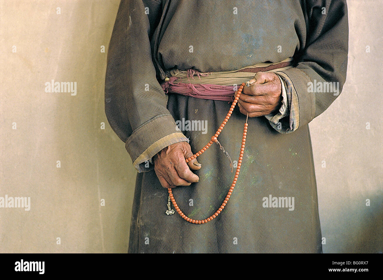 Prayer beads held by a Buddhist woman in Leh, Ladakh, India Stock Photo