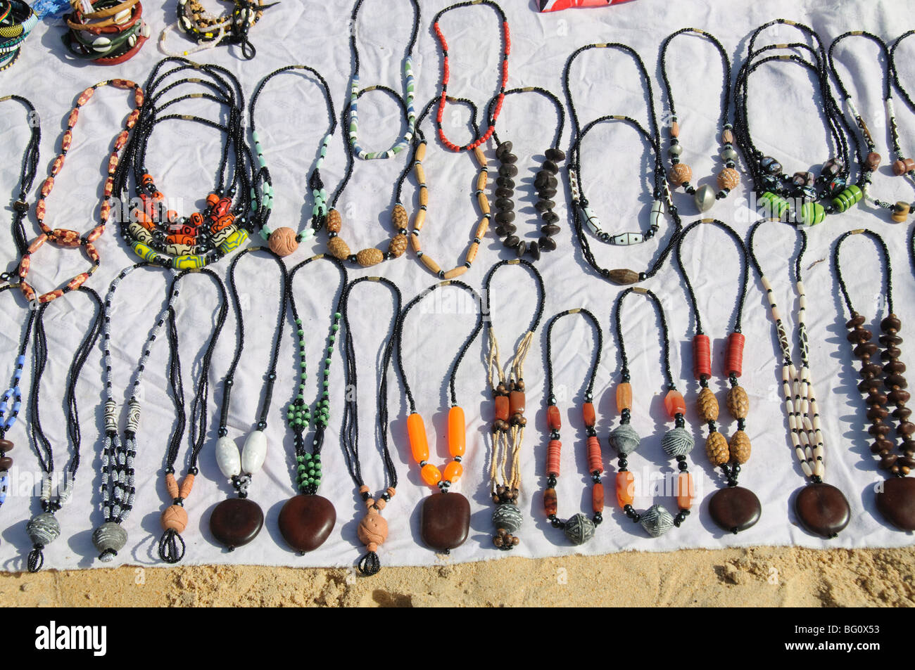 Jewellery sold by hawkers on beach at Saly, Senegal, West Africa, Africa Stock Photo