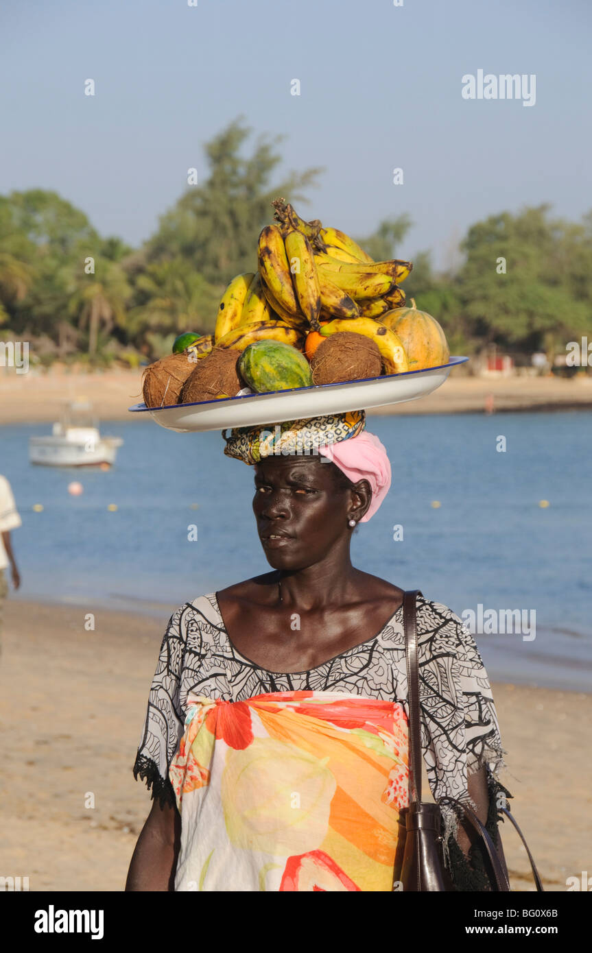 Hawker on beach at Saly, Senegal, West Africa, Africa Stock Photo