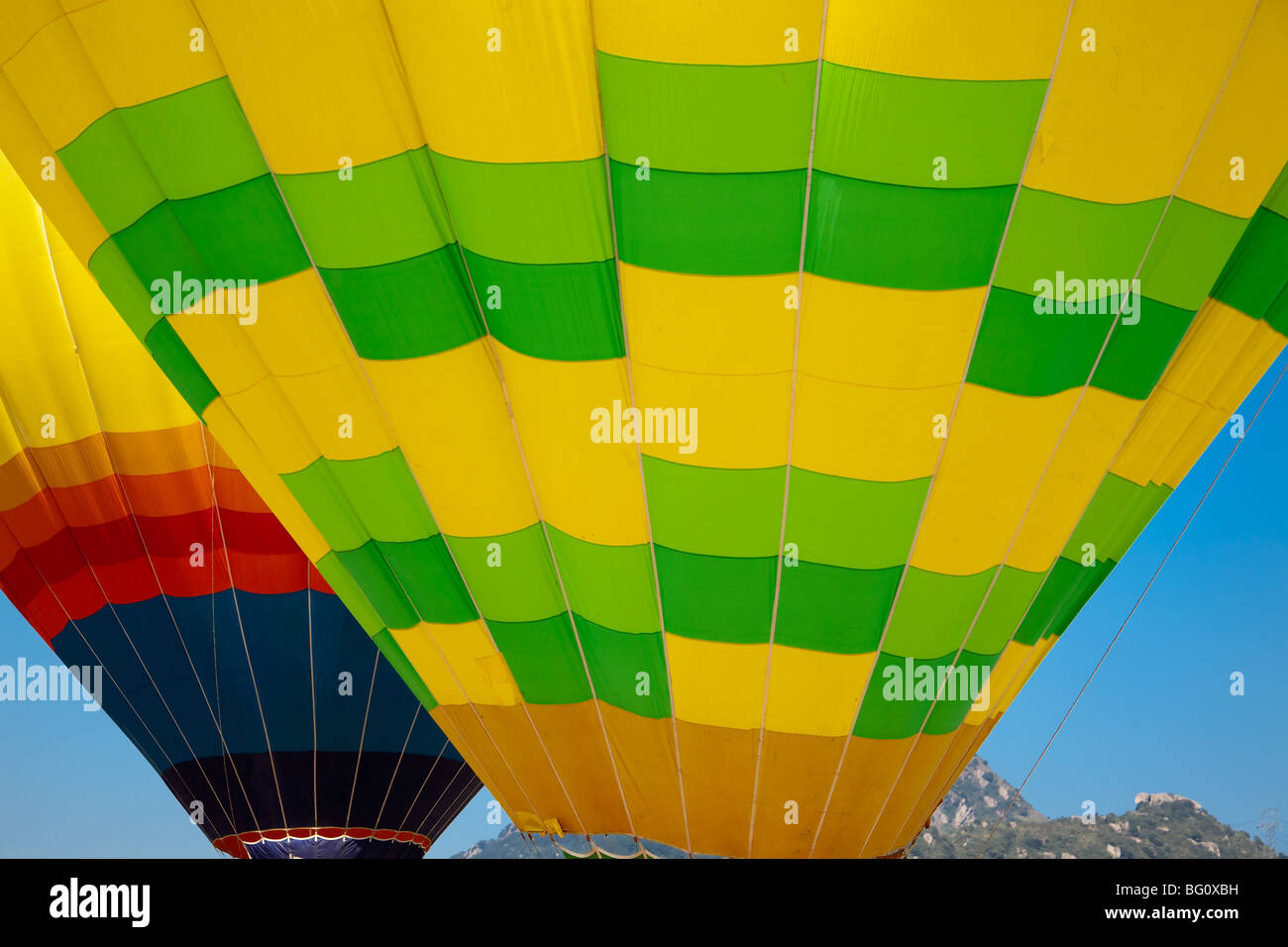 Part of two hot air balloons befeor take-off Stock Photo