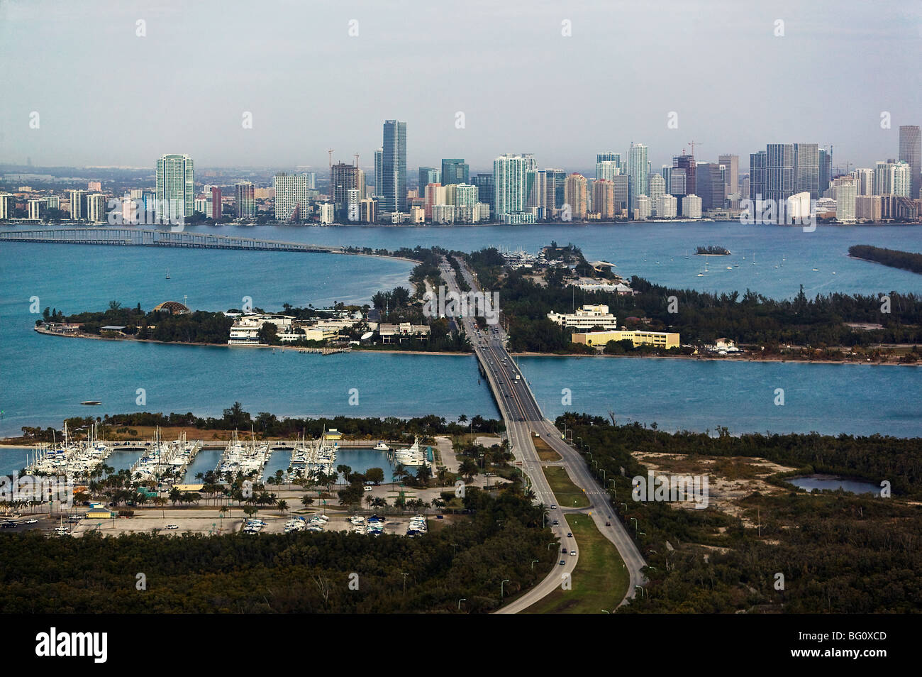 aerial view above Key Biscayne Miami skyline via Bear Cut and Bay bridges Stock Photo