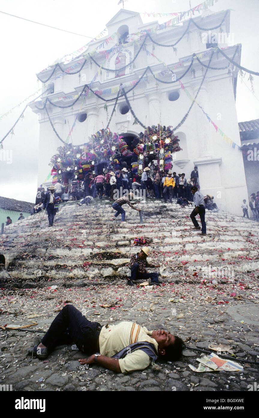 A man lies passed out from drinking too much guaro, a clear alcohol