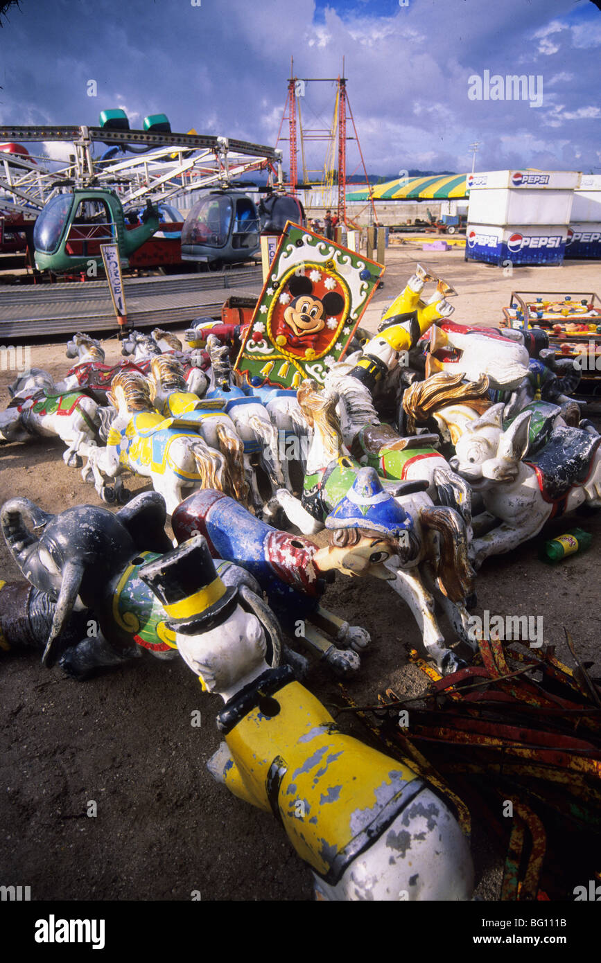 Mouse Carnival Ride Mickey Mouse sits atop a carnival ride about to be erected as part of ...