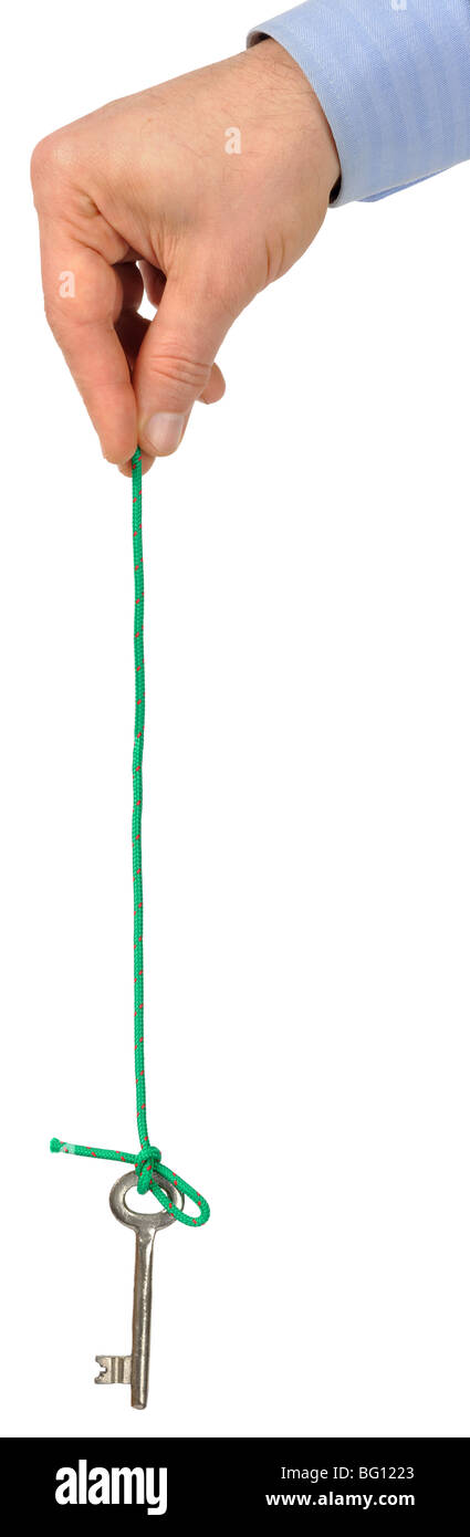 Hand with Key on a String Stock Photo - Alamy