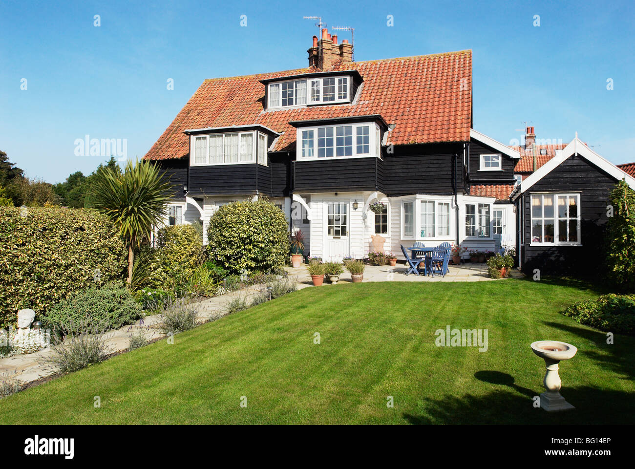 Front garden and semi-detached house. Thorpeness. Suffolk, UK Stock Photo