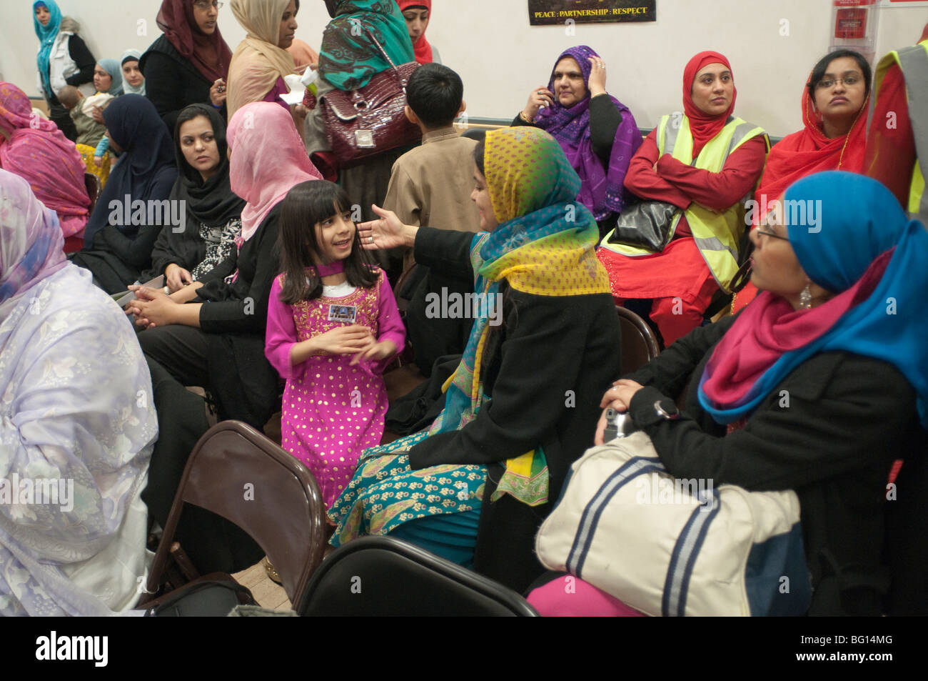 Women in audience at Eid Milad-Un-Nabi Celebrations at Sunni Muslim Association, Tooting, London. Stock Photo