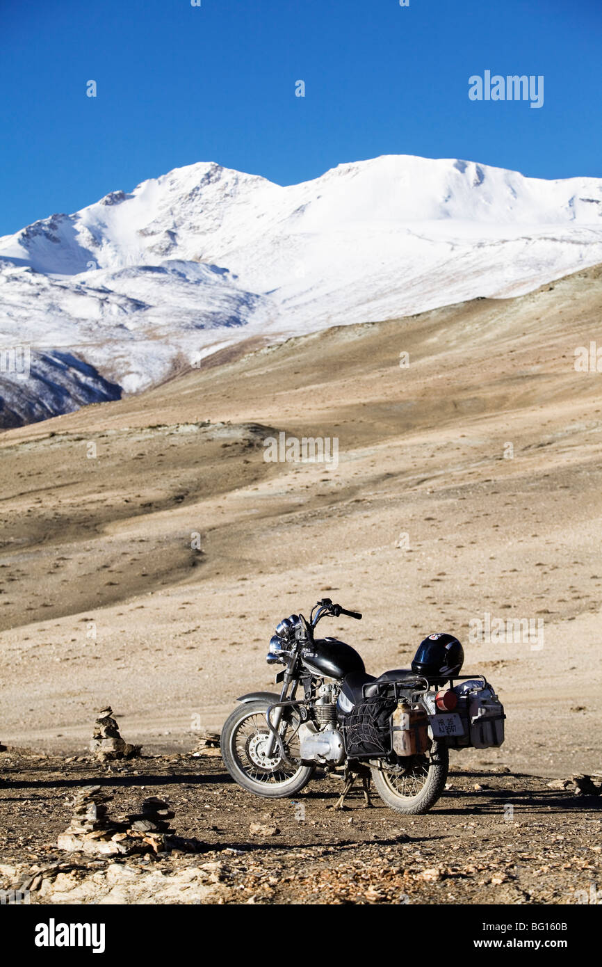 Royal Enfield motorbike near Lake Tsomoriri in Himalayan mountains, Ladakh, India. Stock Photo