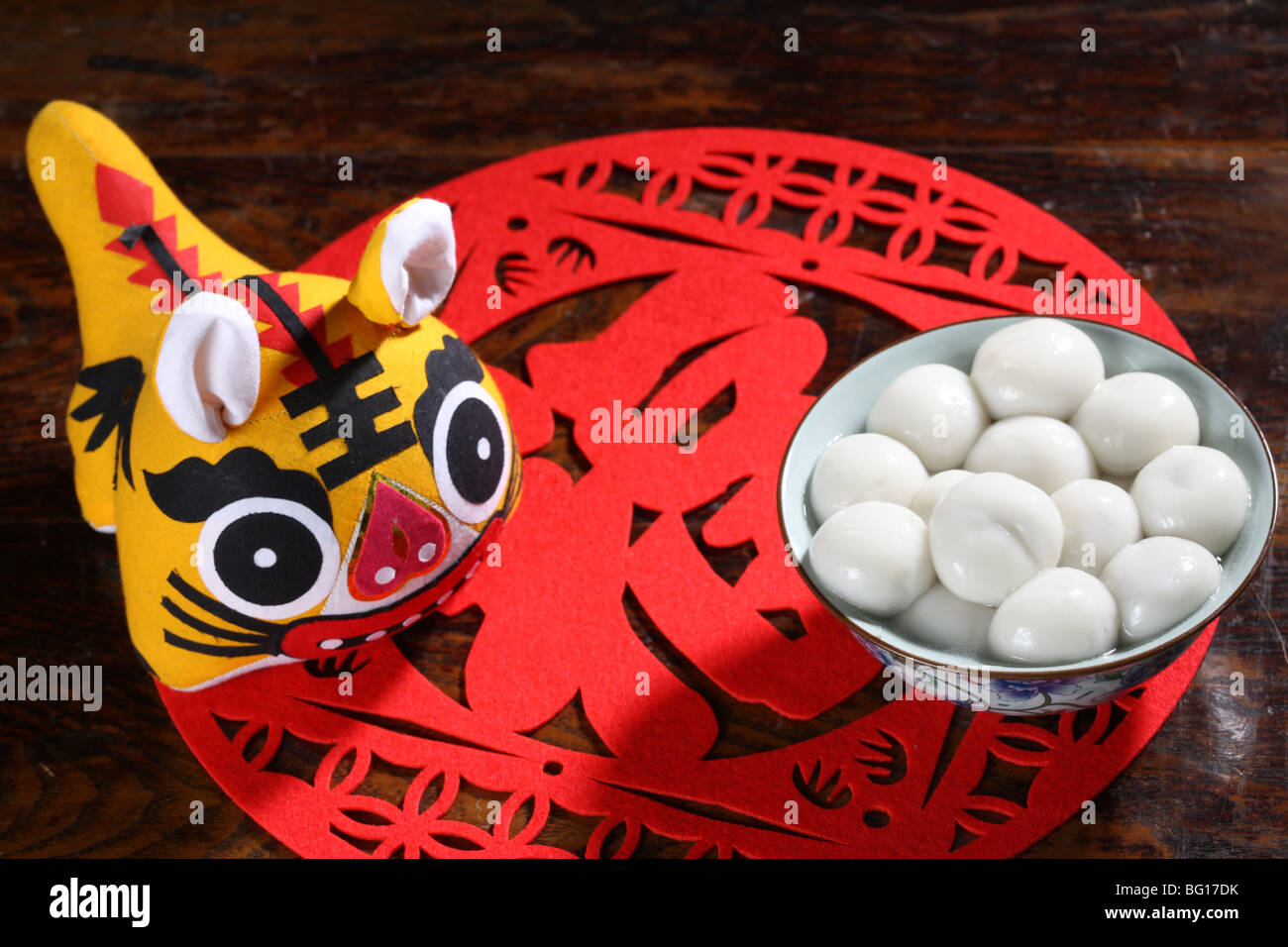 Close-up of Tangyuan and paper cut Stock Photo