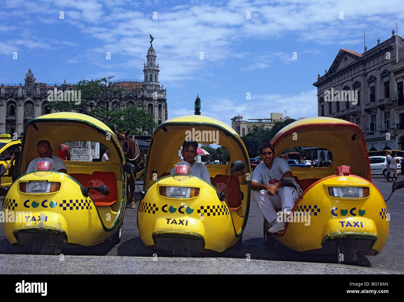 Coco taxi rank outside the Capitolio, Central Havana, Cuba, West Indies, Central America Stock Photo