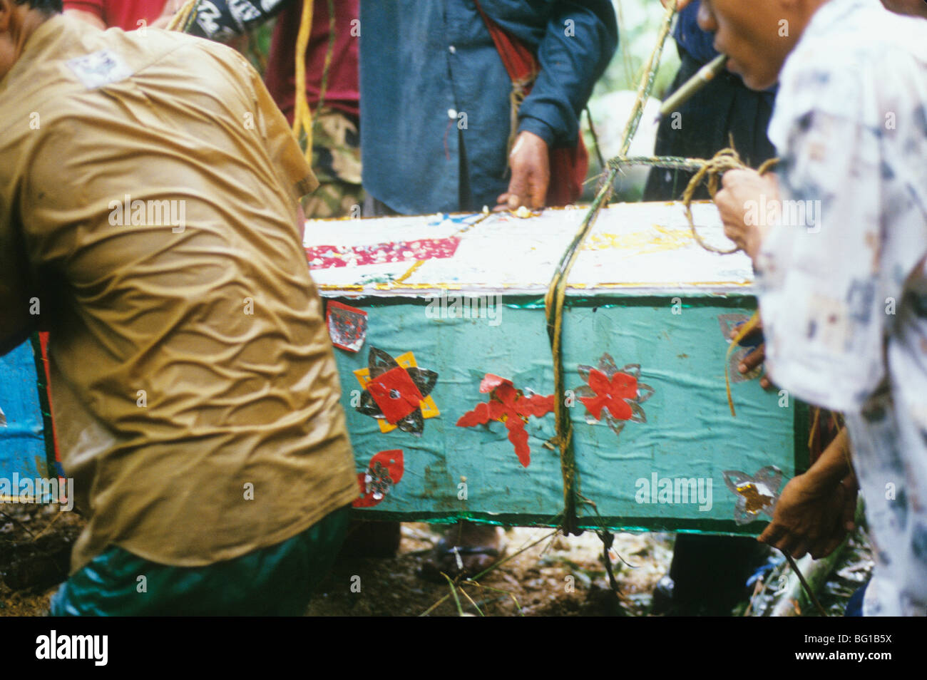 The wooden casket carrying a 24 year old Burmese refugee man who was ...