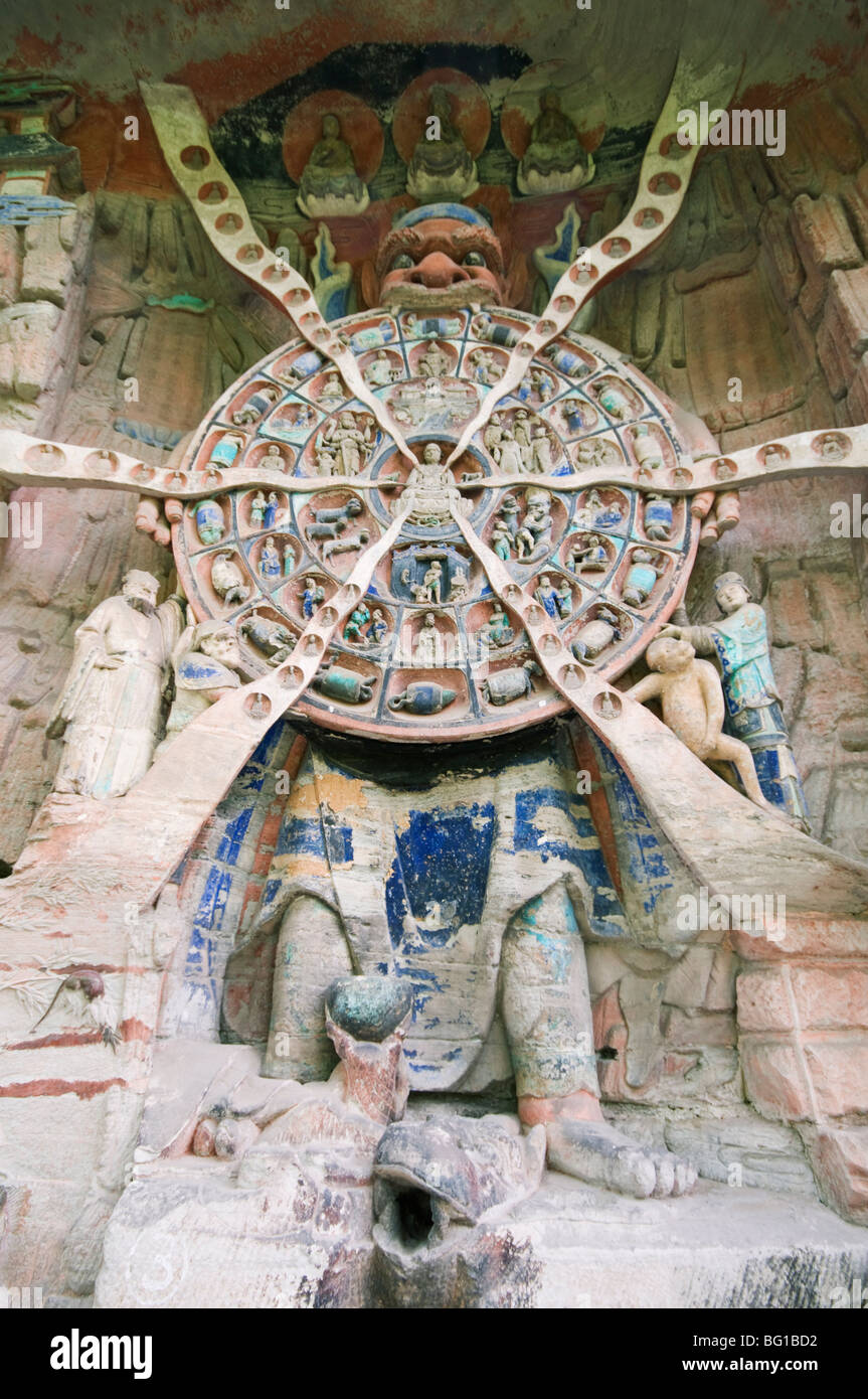Tibetan Buddhist wheel of life rock sculpture at Dazu Rock Carvings, UNESCO, Chongqing Municipality, Fujian Province, China Stock Photo