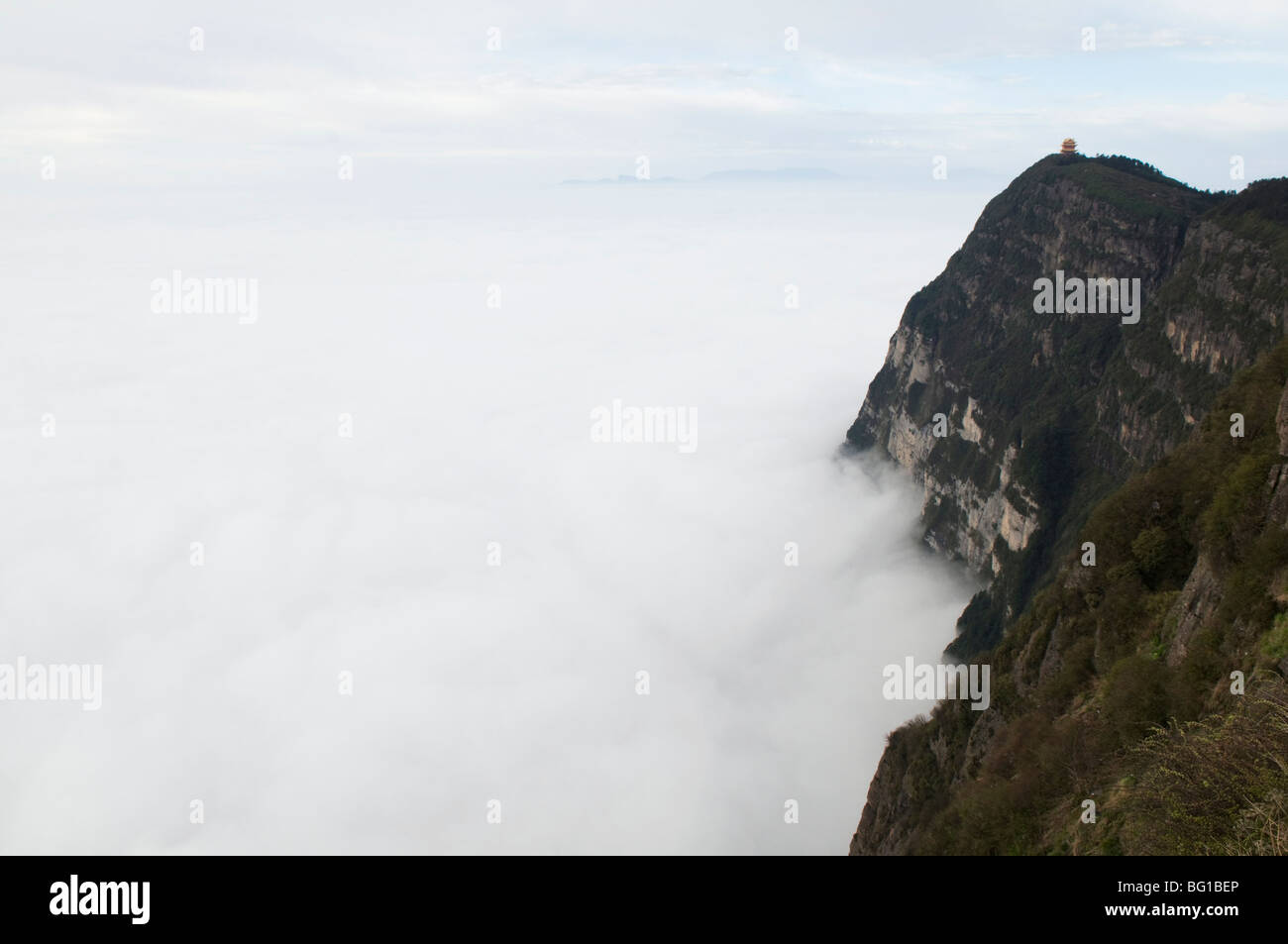 Sea of clouds and Golden Summit temple at Mount Emei Shan, Mount Emei Scenic Area, UNESCO, Sichuan Province, China Stock Photo