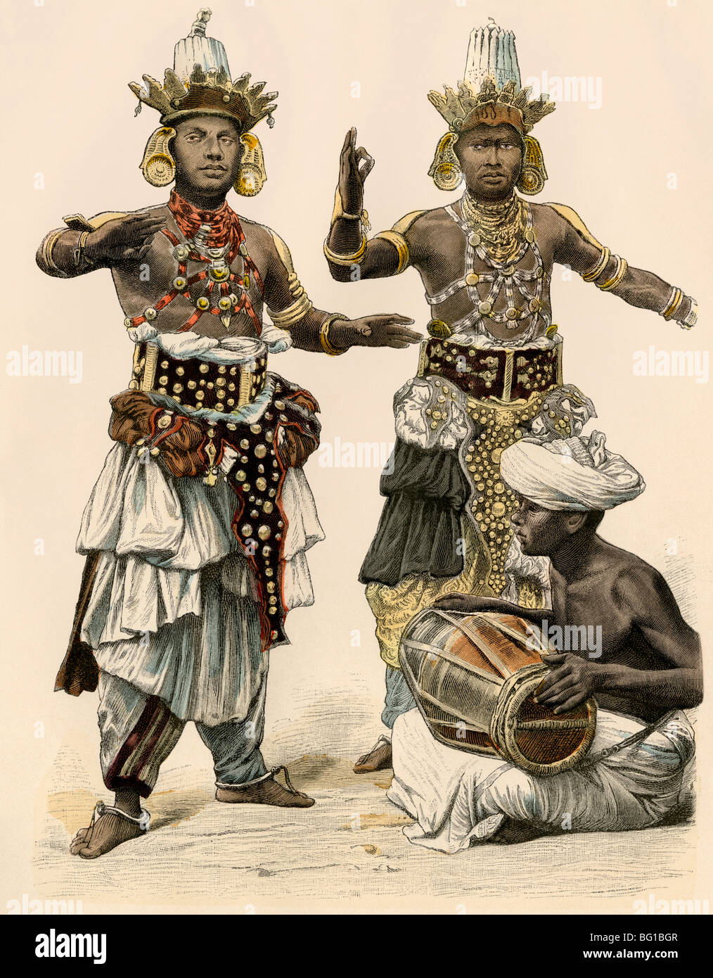 Devil dancers and drummer in Ceylon (Sri Lanka), 1800s. Hand-colored print Stock Photo